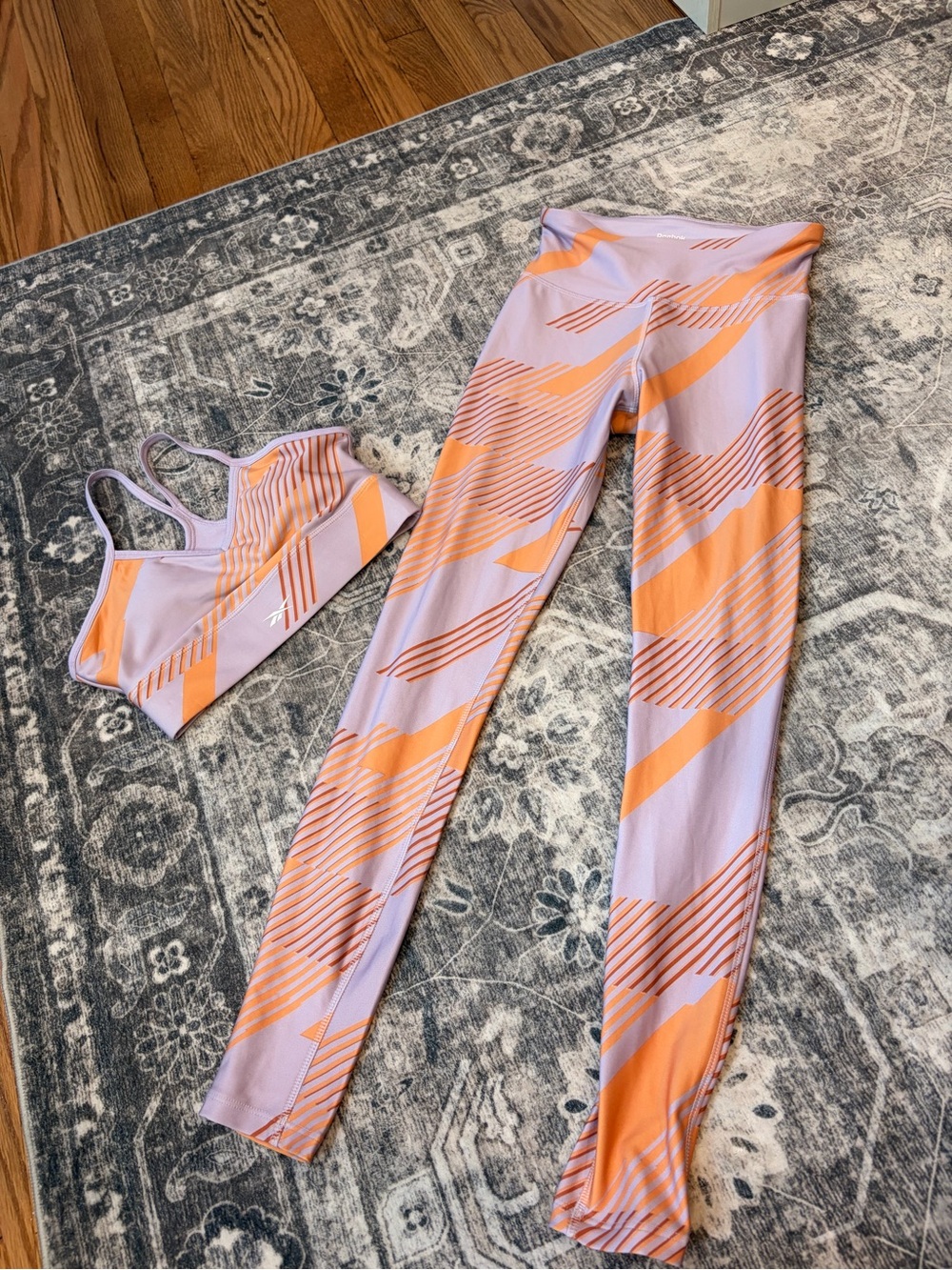 Reebok Lavender and Orange Graphic High-Rise Leggings with matching sports bra
